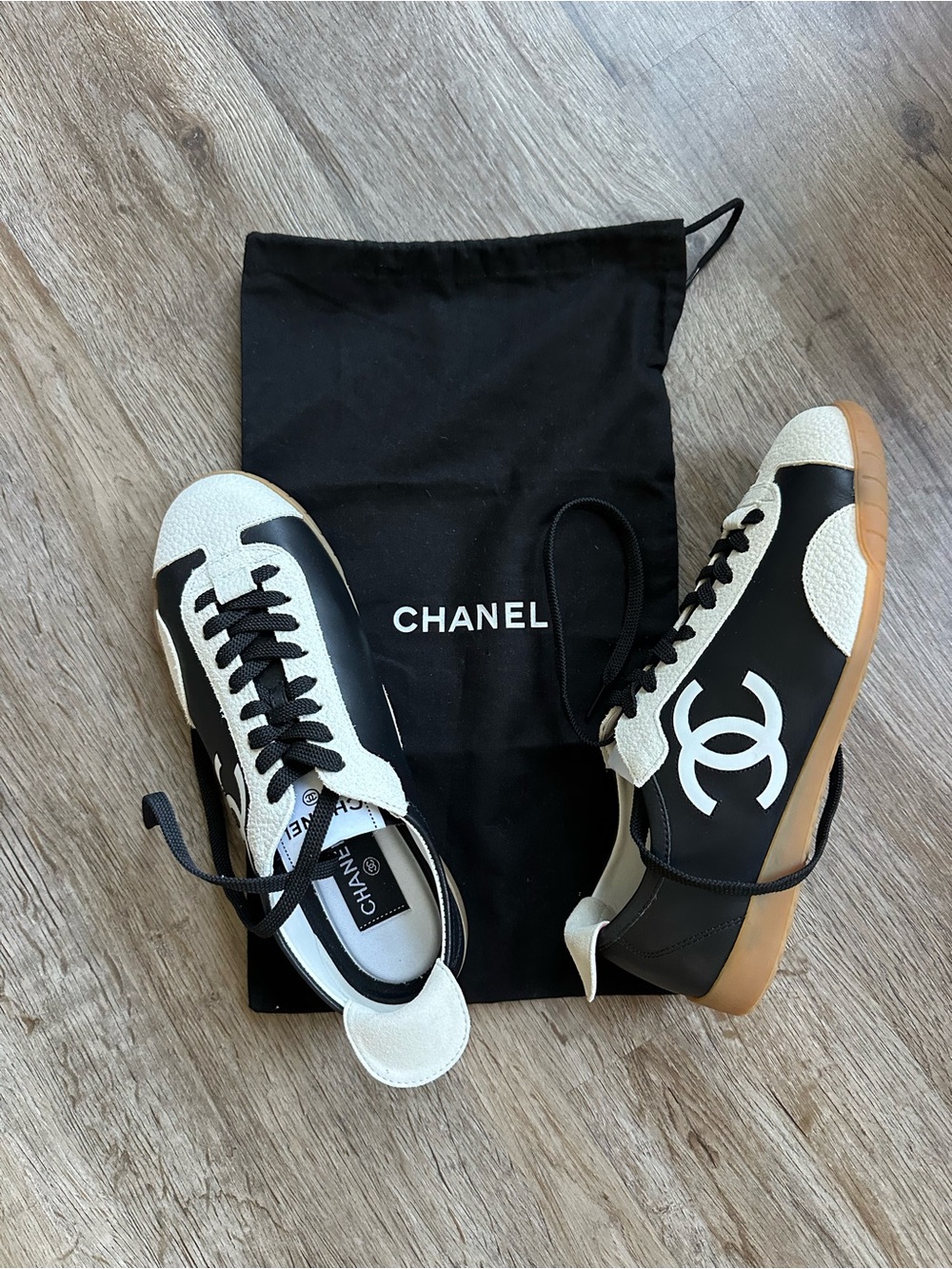 CHANEL Black and White Sneakers with CC Logo